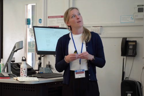 Prof. Sara Lowes presenting her Research